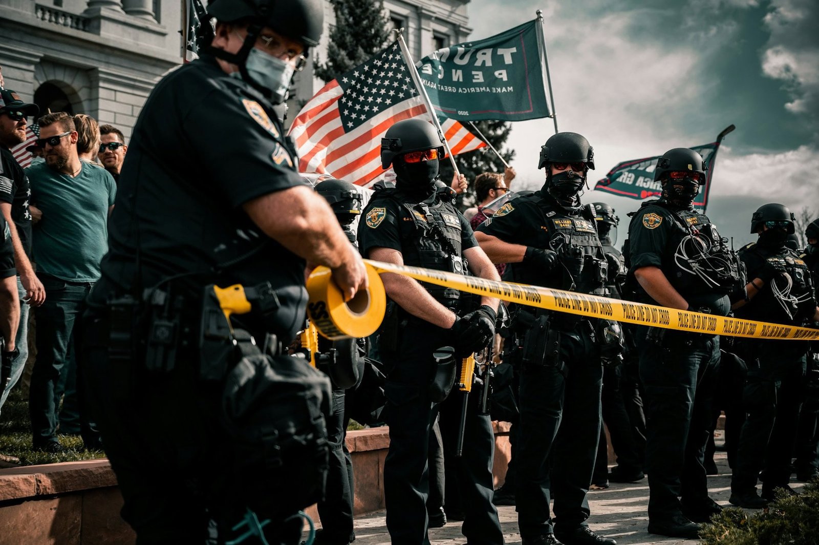 Protests and Policing: A Nation at a Crossroads colin lloyd fthpxiq6by0 unsplash (1)